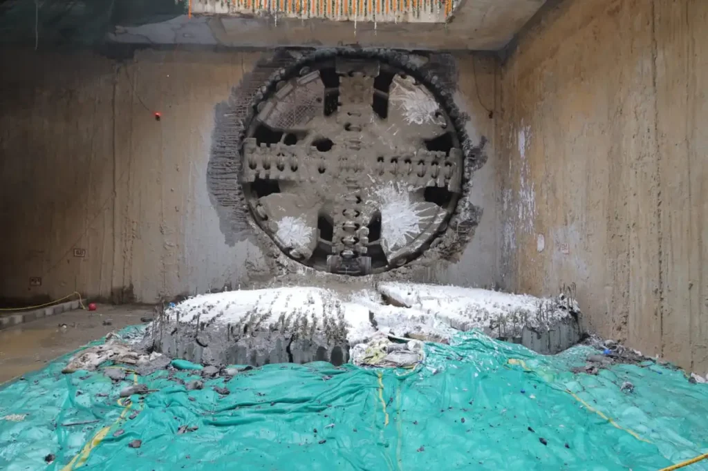 TBM breakthrough at Tughlakabad Railway Colony during DMRC Phase 4 tunneling.