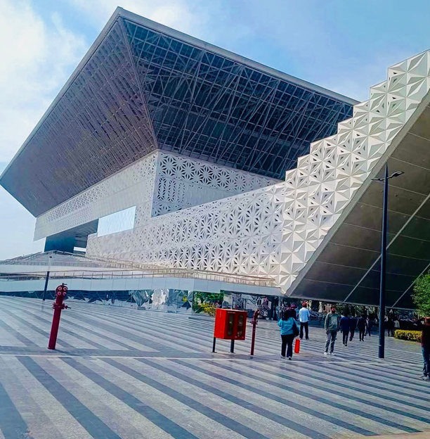 Exterior view of Yashobhoomi Convention Centre, New Delhi, showcasing its angular façade and geometric envelope design.