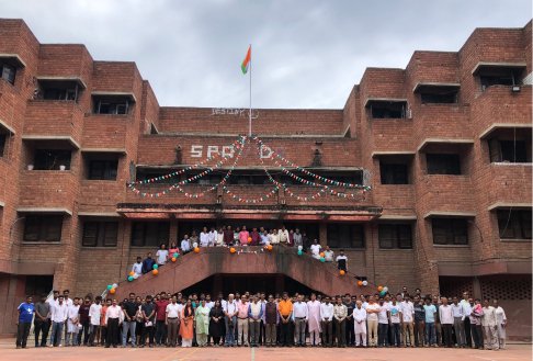 Faculty, staff, and students of SPA Delhi assembled for Independence Day celebrations at the main brick building.