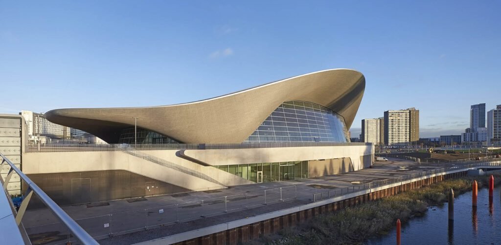 The London Aquatics Centre with sweeping curved roof designed by Zaha Hadid for the 2012 Olympics.