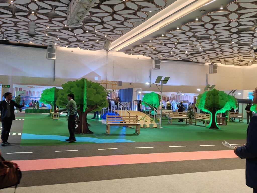 Interactive exhibition zone depicting sustainable urban mobility and green public spaces at the National Urban Conclave 2025.