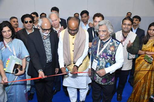 Officials inaugurating the exhibition area with a ribbon-cutting ceremony at the Tribal Business Conclave 2025.