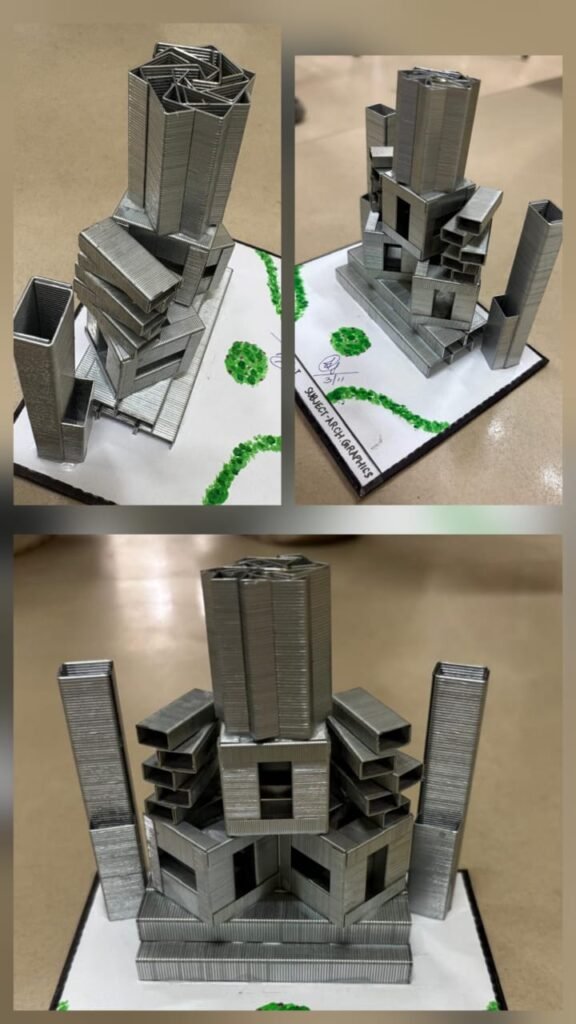 Vertical stapler-pin structures showcasing complex stacking, voids, and interlocking geometries crafted by first-year architecture students at DSEU Aryabhatta Campus.