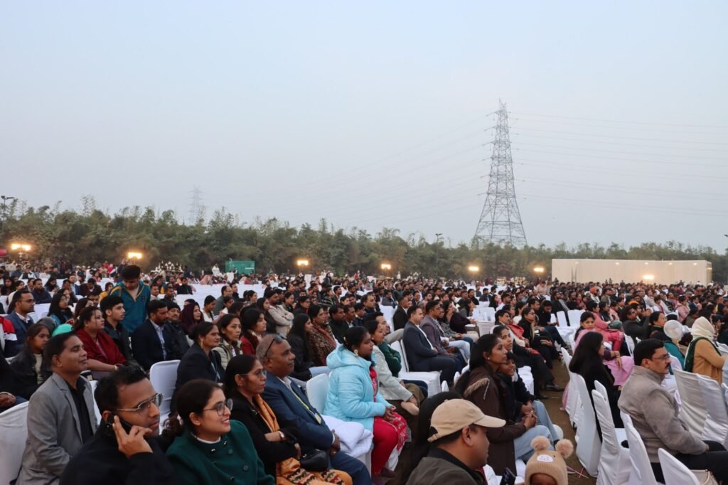 Large gathering of DDA officials, employees, and families attending the 69th Foundation Day celebrations at Baansera Park, Delhi