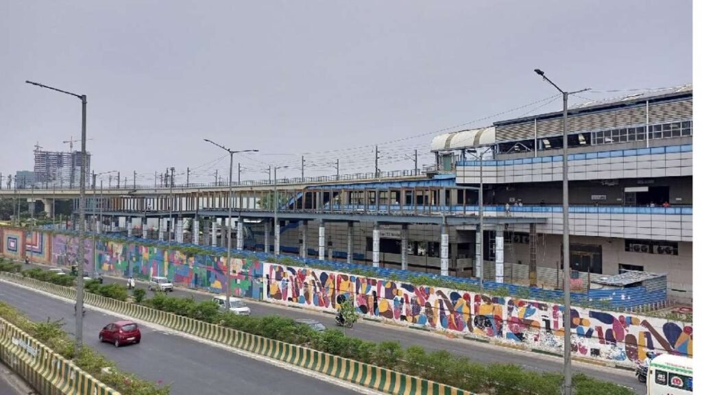 Air-conditioned pedestrian skywalk connecting Noida Metro Aqua Line Sector 51 and Delhi Metro Blue Line Sector 52.