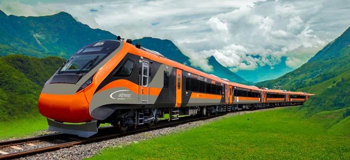 Exterior view of India’s Vande Bharat Sleeper Train showcasing modern high-speed design in a scenic landscape