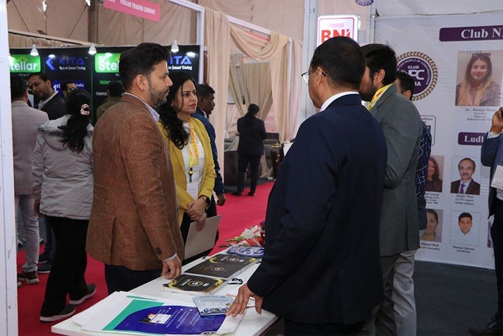 Visitors interacting with exhibitors and product displays at INTEXT Expo 2026 Ludhiana
