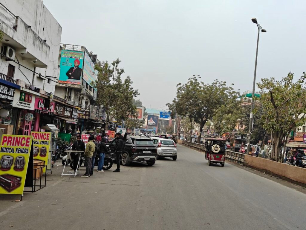 Furniture and musical instrument shops encroaching the footpath along Jail Road in West Delhi