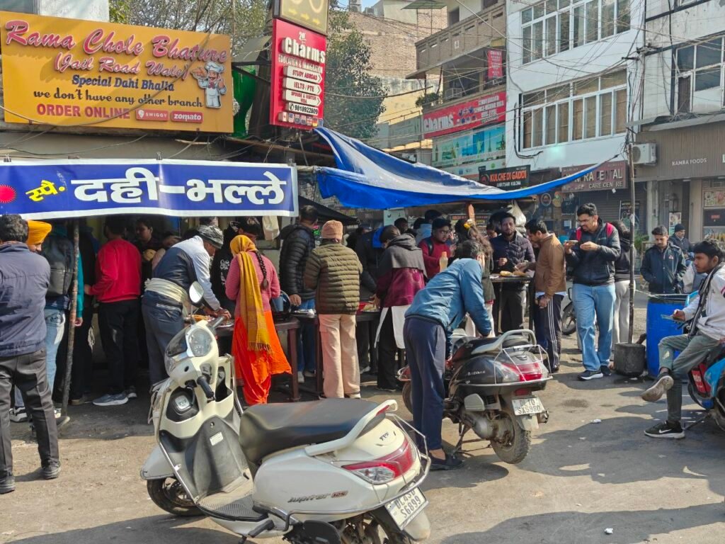 Crowd gathered at Rama Chole Bhature stall on Jail Road, a popular street food spot in Tilak Nagar