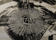 Early construction stage of Matrimandir showing spherical structural framework in Auroville