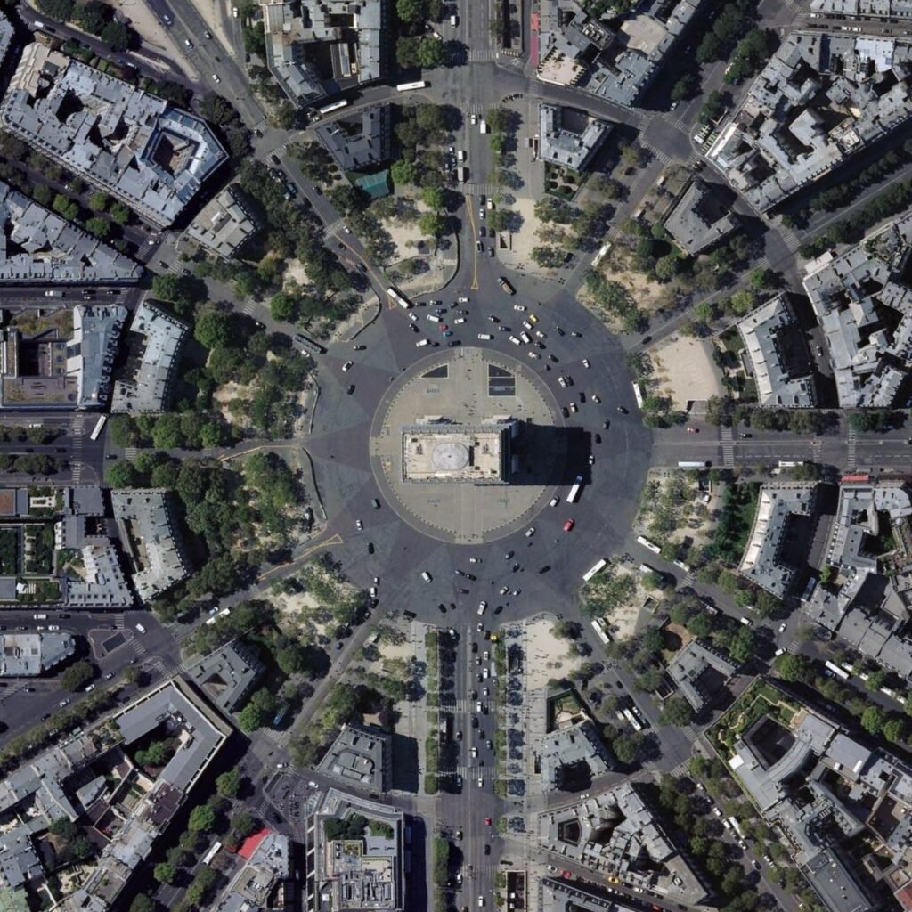 Aerial view of Arc de Triomphe showing radial boulevard planning in Paris