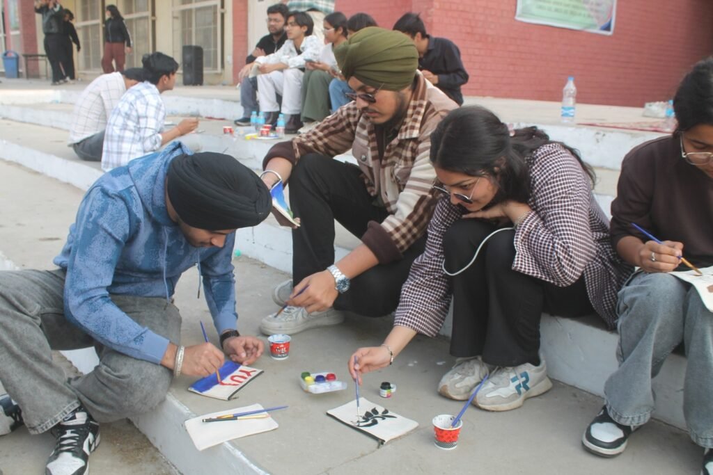 Architecture students painting canvas pouches during NEXUS 2026 workshop