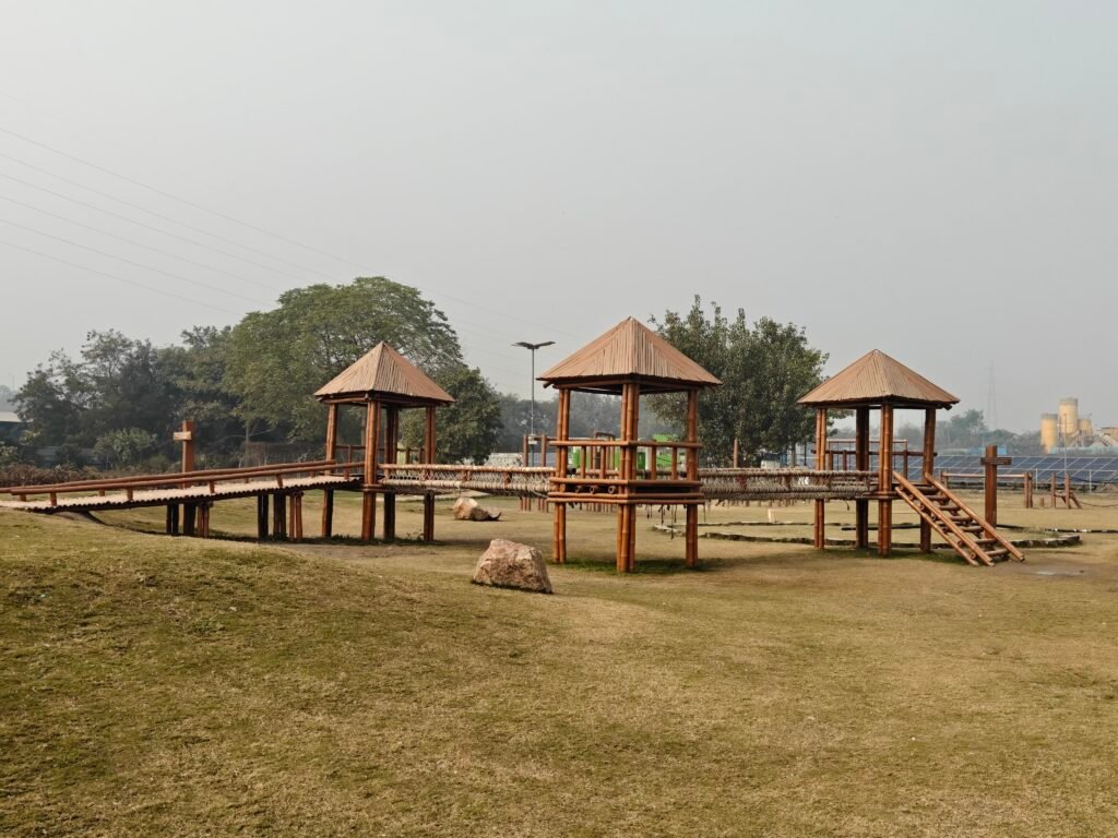 Eco-friendly wooden adventure playground structure at Baansera Park Delhi