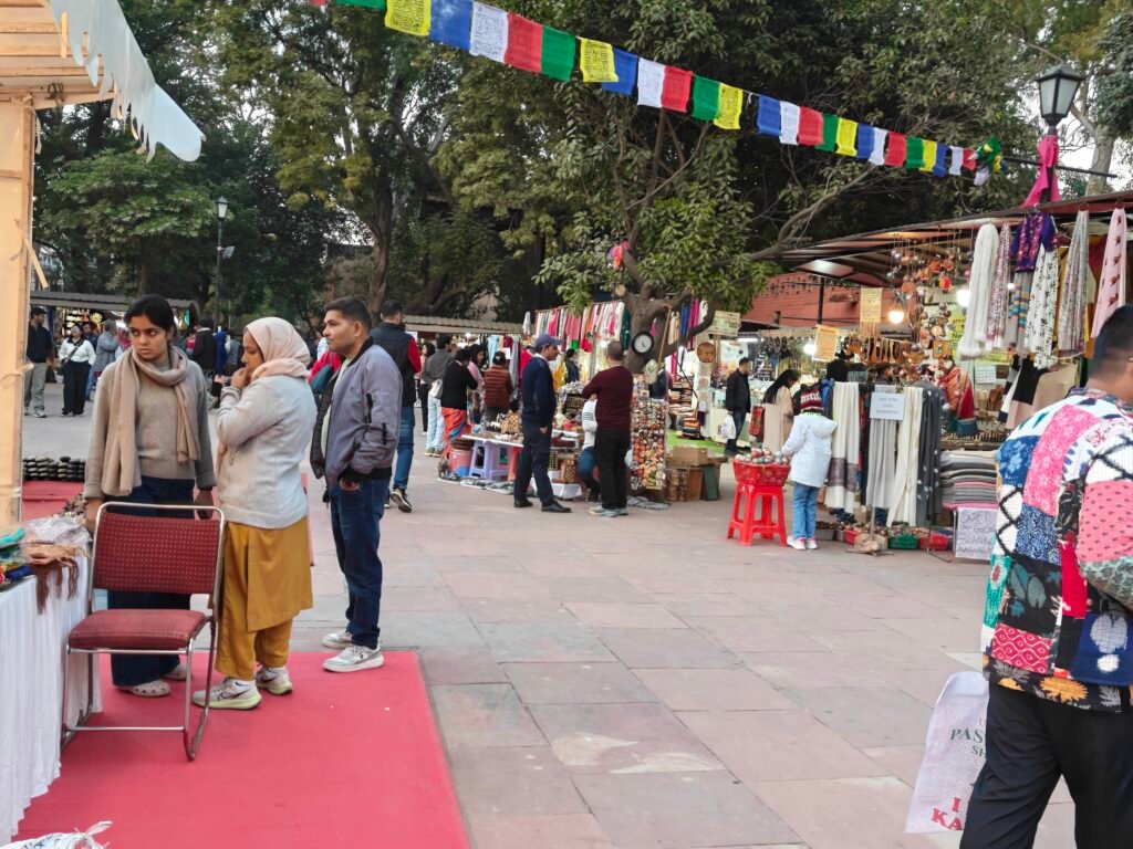 Craft street at Dilli Haat INA with informal stalls, handmade products and visitors