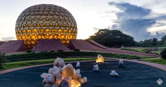 Matrimandir golden sphere meditation centre at Auroville surrounded by gardens and pathways