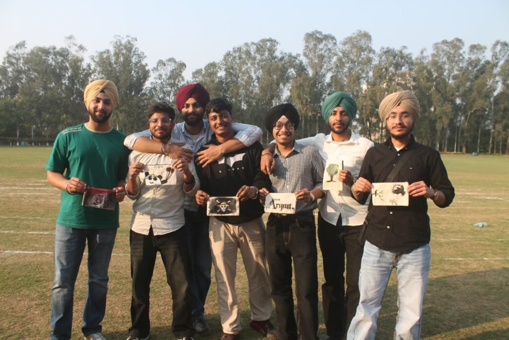 Group of architecture students holding canvas artwork at NEXUS 2026 Ludhiana