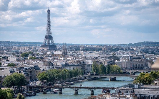 Paris cityscape showing Haussmann boulevards and urban planning with Eiffel Tower view