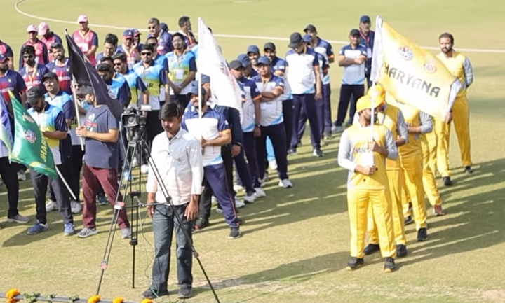 Participants marching with flags during ITPI Sports Meet 2026 opening ceremony