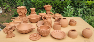 Traditional potters training at INTACH pottery workshop in Jammu