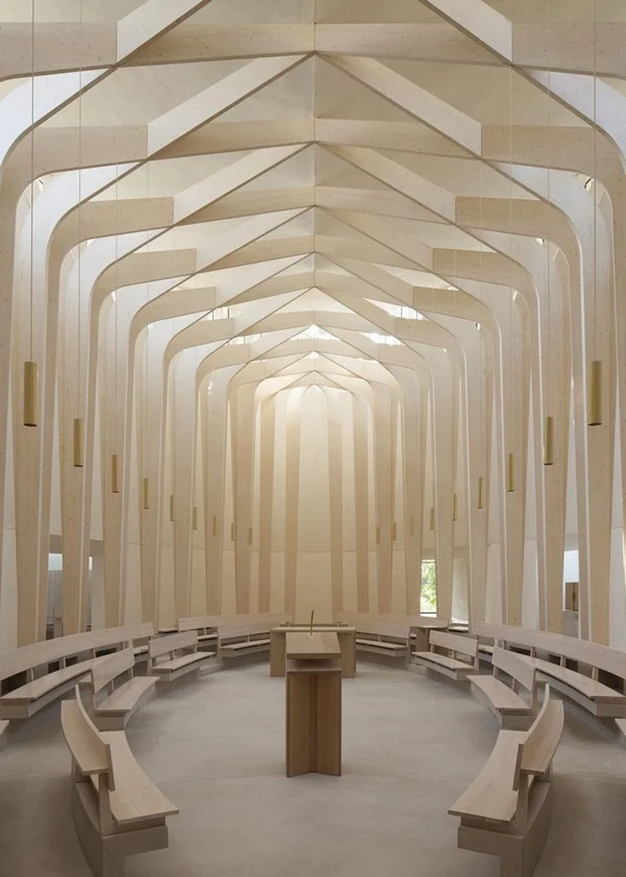 Geometric timber roof structure of Bishop Edward King Chapel by Niall McLaughlin
