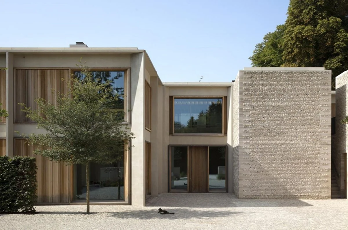 Exterior of Hampshire House with minimalist stone and timber facade