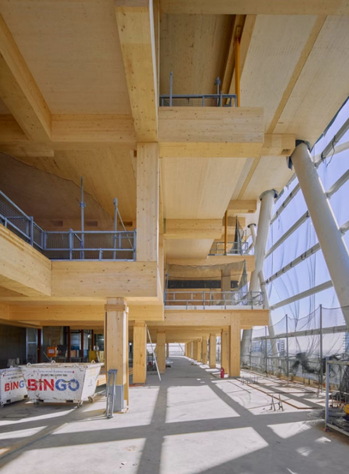 Interior construction of Atlassian Central showing exposed timber columns and beams