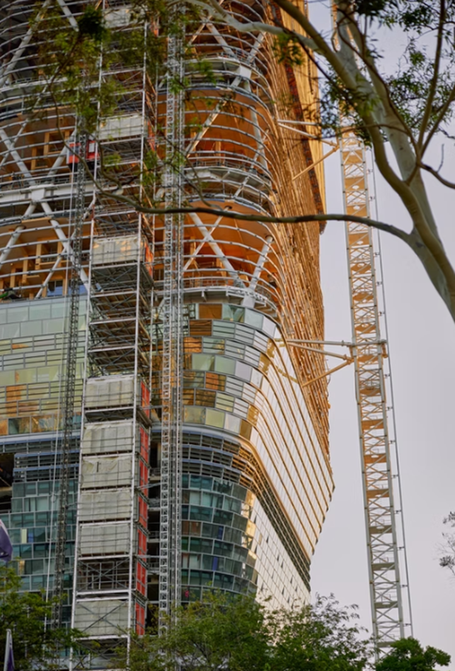 Close-up of Atlassian Central facade showing steel exoskeleton and timber integration