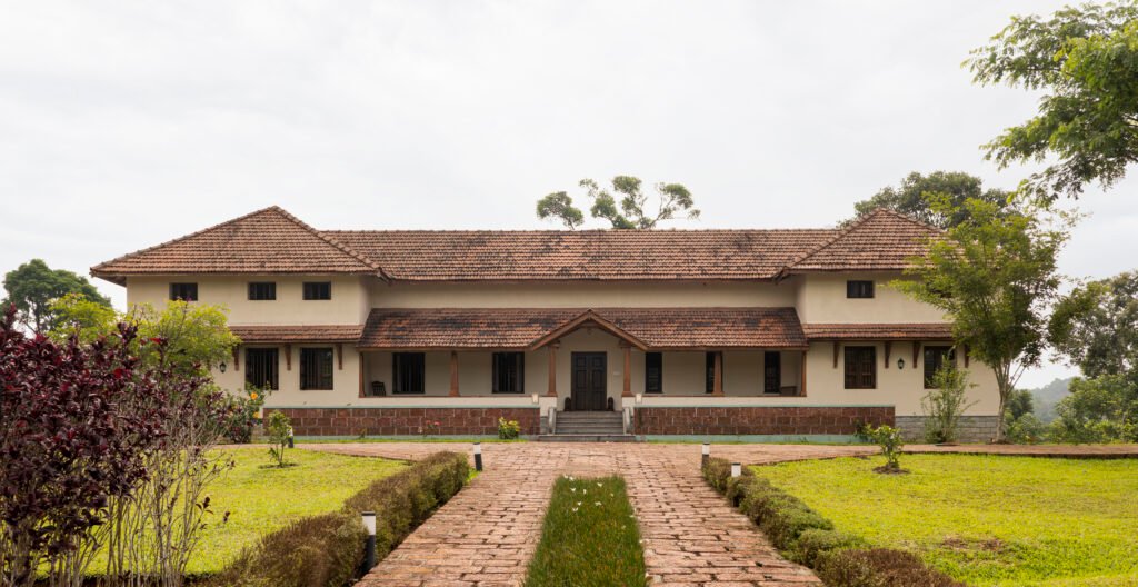 Exterior view of Huilekere House with traditional tiled roof architecture