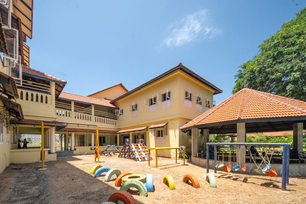 Courtyard and play area at Sankalp School designed in contemporary vernacular style