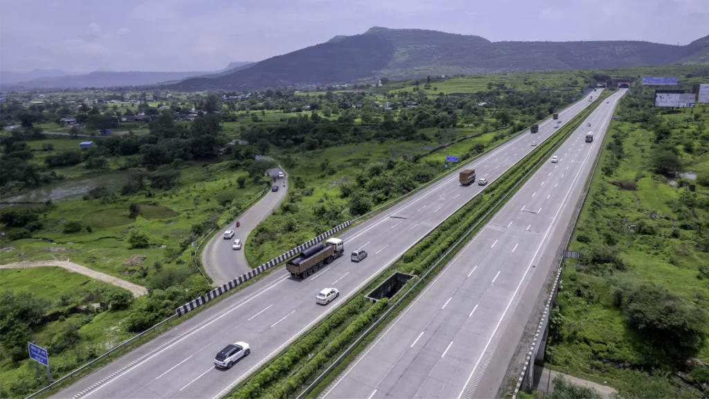 Modern national highway corridor representing NHAI's 1,692 km highway monetisation pipeline across nine Indian states for FY 2026-27.