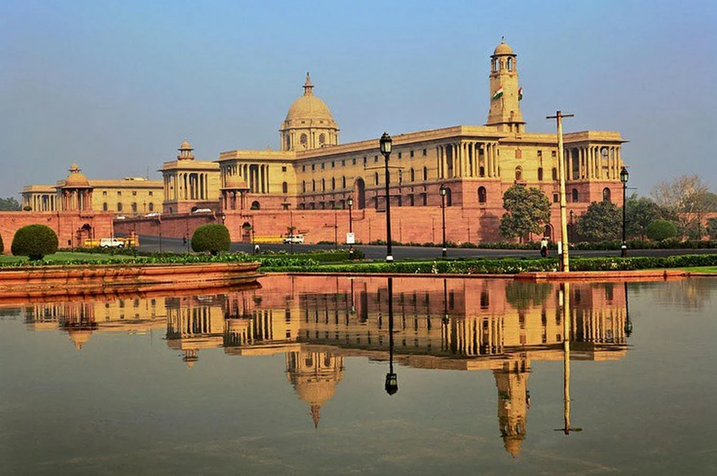 North and South Block buildings near Rashtrapati Bhavan reflected in water at Raisina Hill, New Delhi