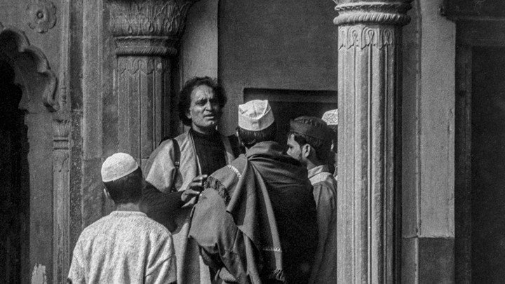 Raghu Rai interacting with people while documenting cultural life in India