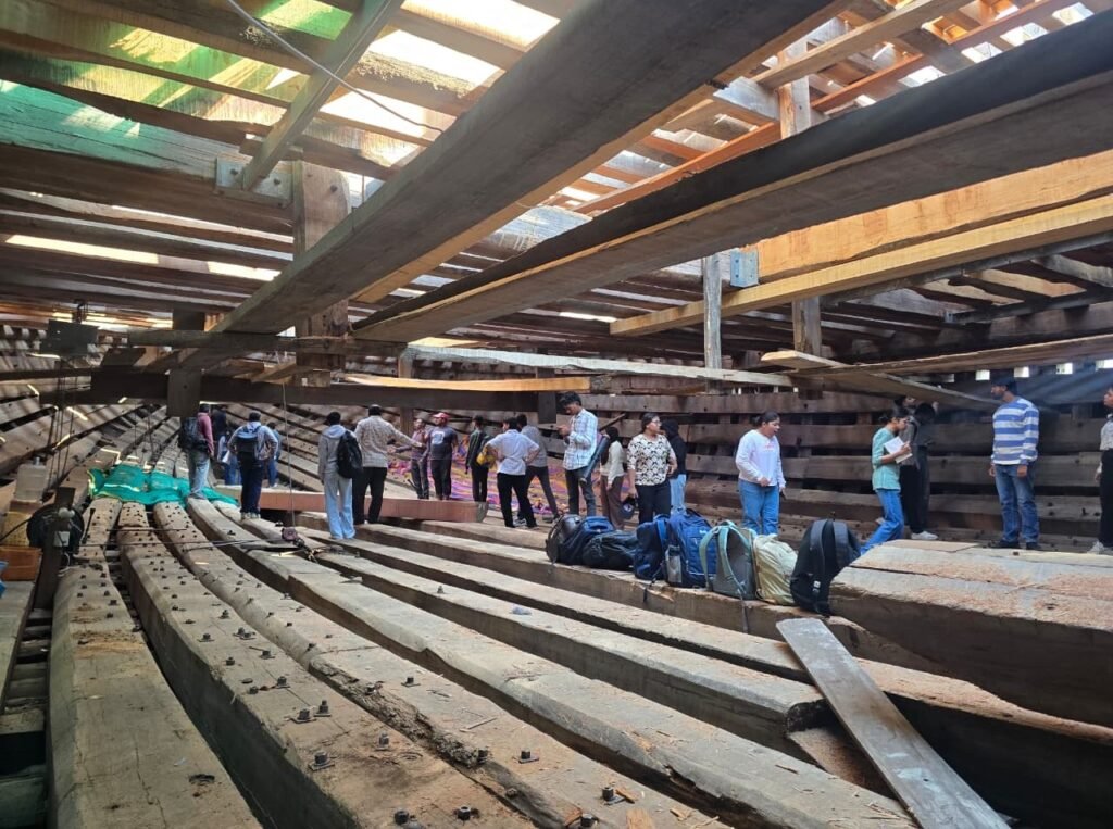 Interior structure of a large wooden ship under construction in Mandvi