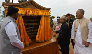 Former President Pranab Mukherjee at a memorial inauguration ceremony; DUAC seeks design revisions for proposed Rajghat memorial.