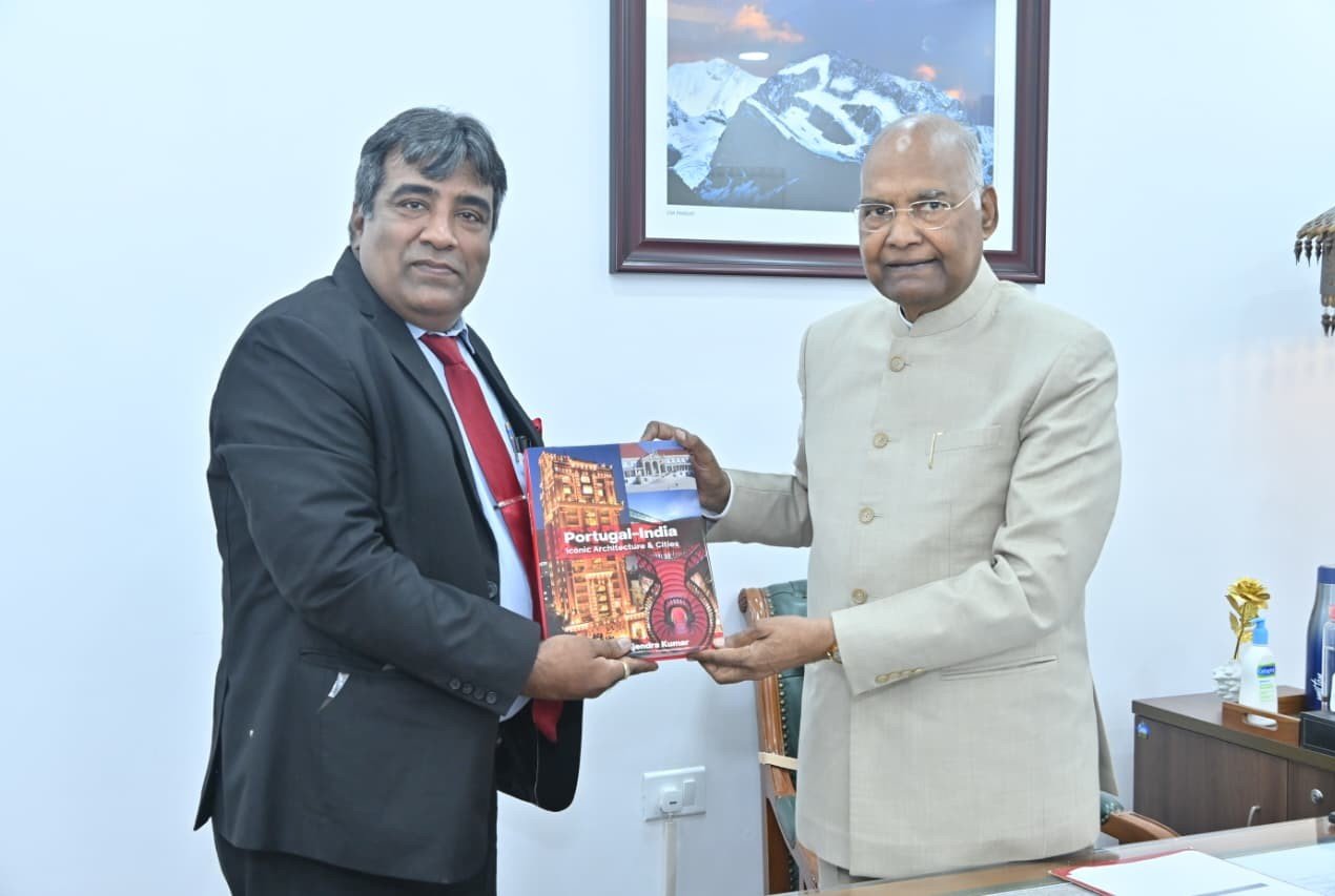 Rajendra Kumar presenting his book Portugal–India: Iconic Architecture and Cities to the President of India.