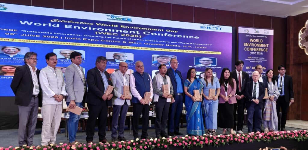 Panelists and speakers at the World Environment Day 2026 Conference discussing sustainable urban infrastructure and waste management in Greater Noida.