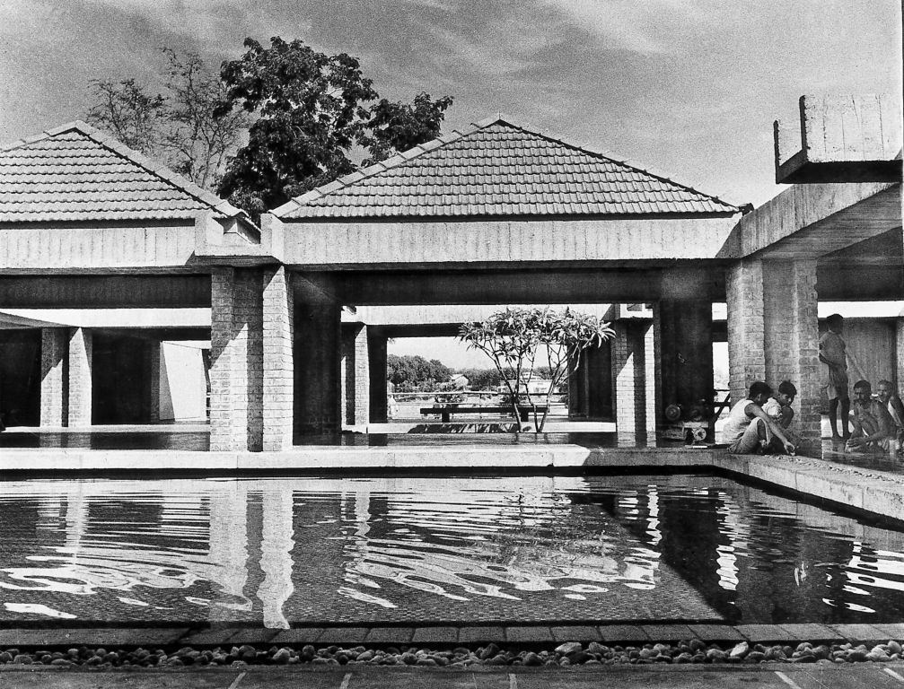 Gandhi Smarak Sangrahalaya at Sabarmati Ashram designed by Charles Correa using climate-responsive architecture and simple modular pavilions.