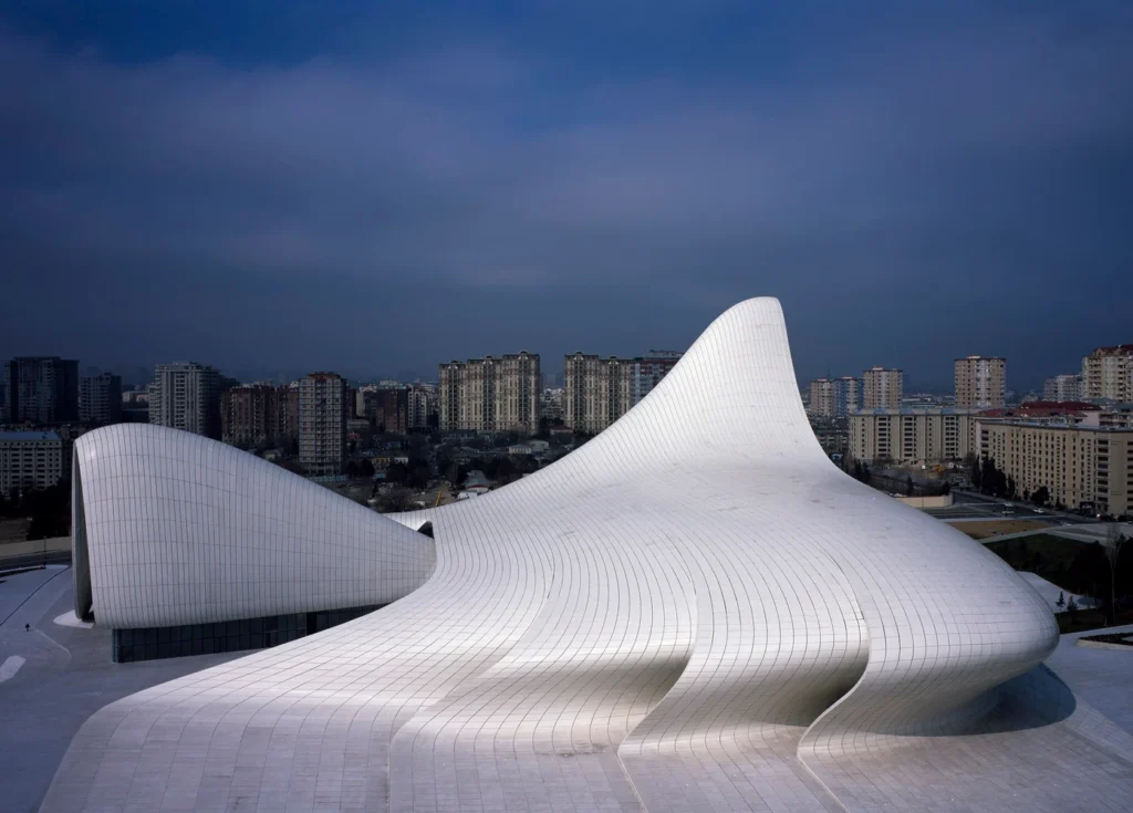 Aerial view of the flowing roof form of the Heydar Aliyev Center in Baku.