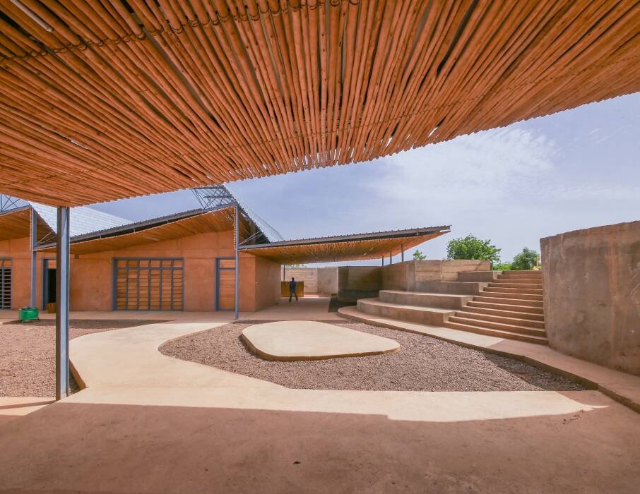 Shaded courtyard and clay classroom blocks at Burkina Institute of Technology