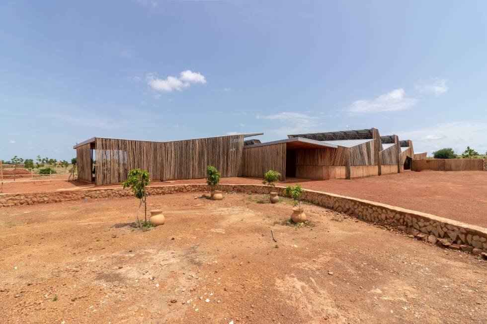 Exterior view of Burkina Institute of Technology with eucalyptus screens and clay walls