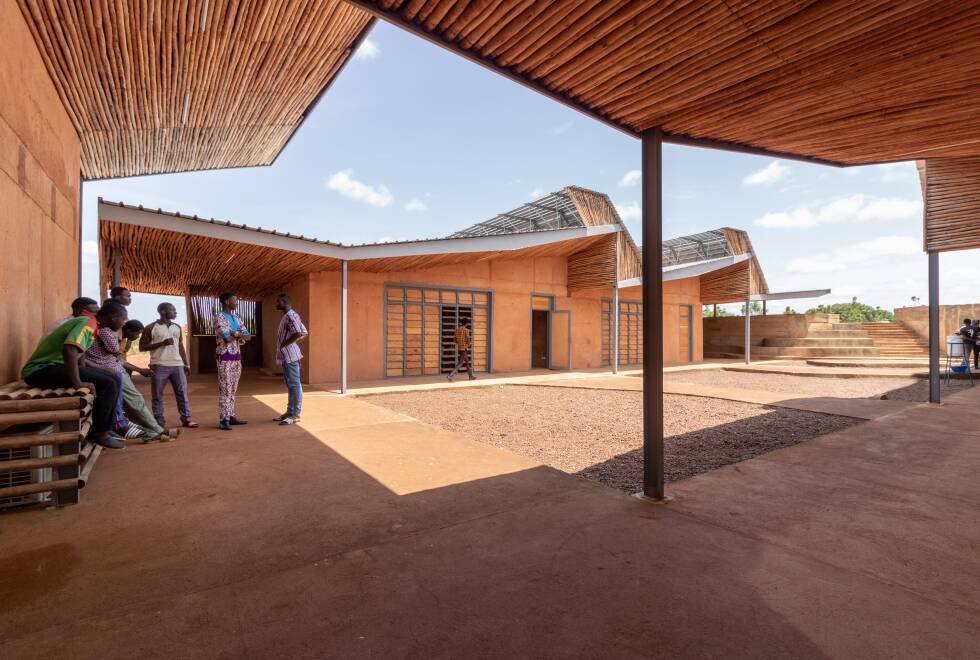 Students gathering in the shaded courtyard of Burkina Institute of Technology