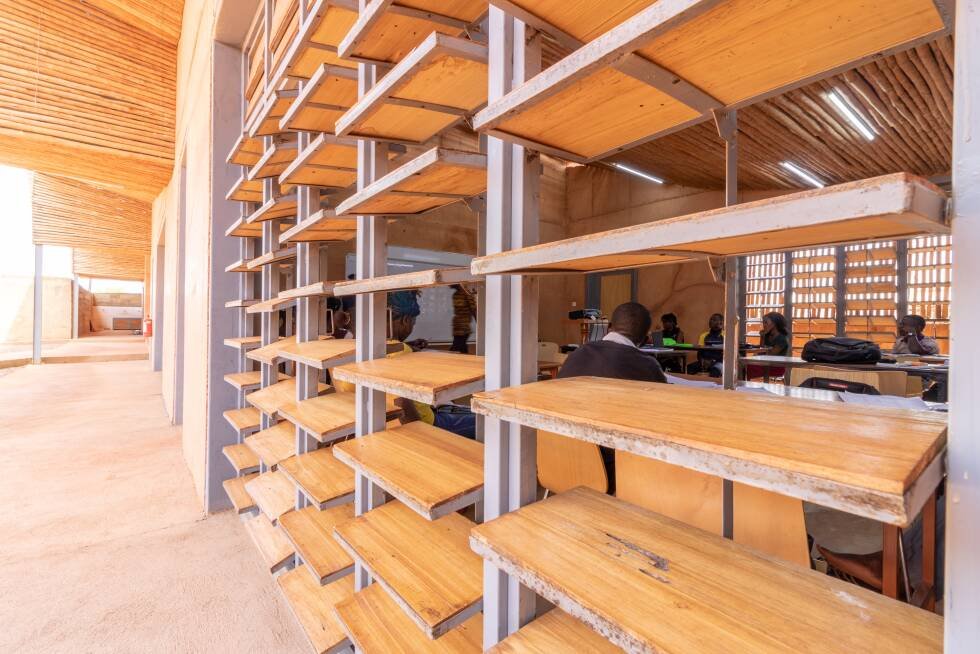 Classroom viewed through the timber louvre façade at Burkina Institute of Technology