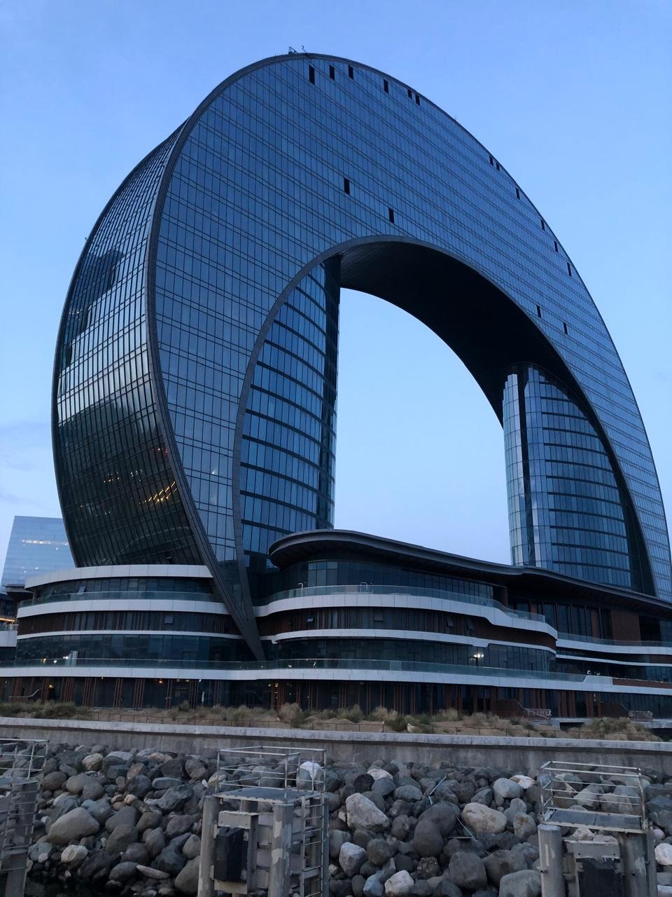 Contemporary glass-and-steel architecture along the waterfront in Baku, Azerbaijan.