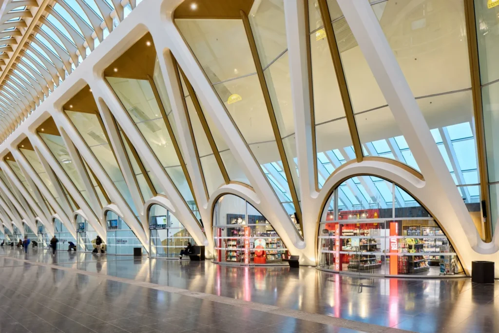 Interior concourse and commercial spaces at Gare de Mons