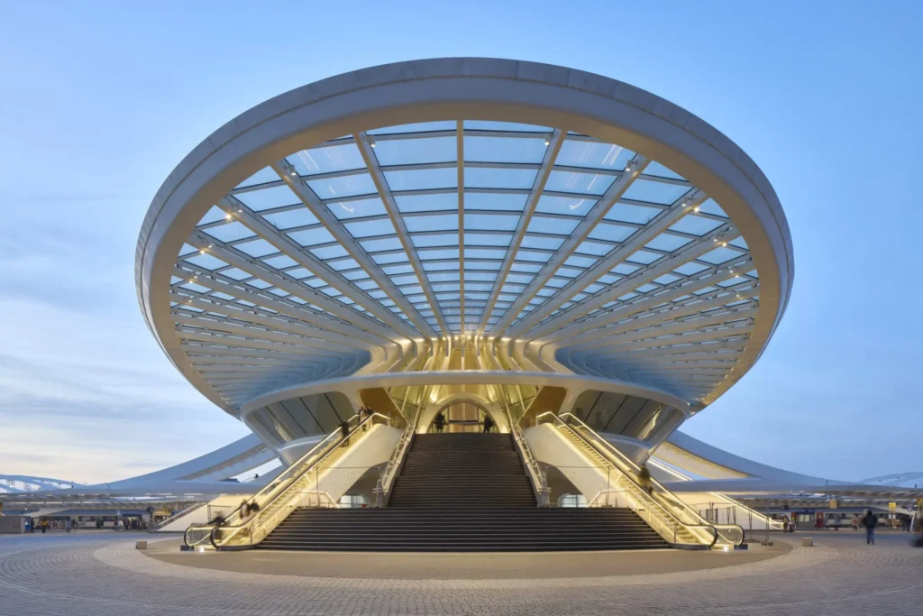 Main entrance and monumental pedestrian bridge of Gare de Mons