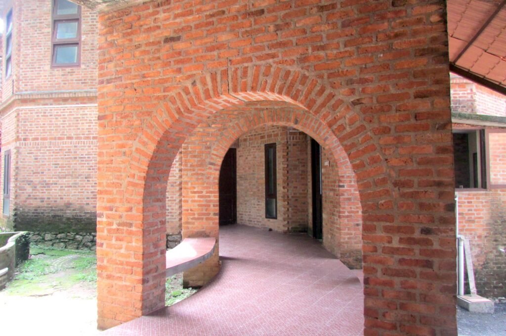 Exposed brick arches designed by Laurie Baker at the Centre for Development Studies