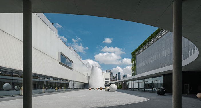 Contemporary architecture and courtyard at Dib Bangkok art museum, adapted from an existing warehouse