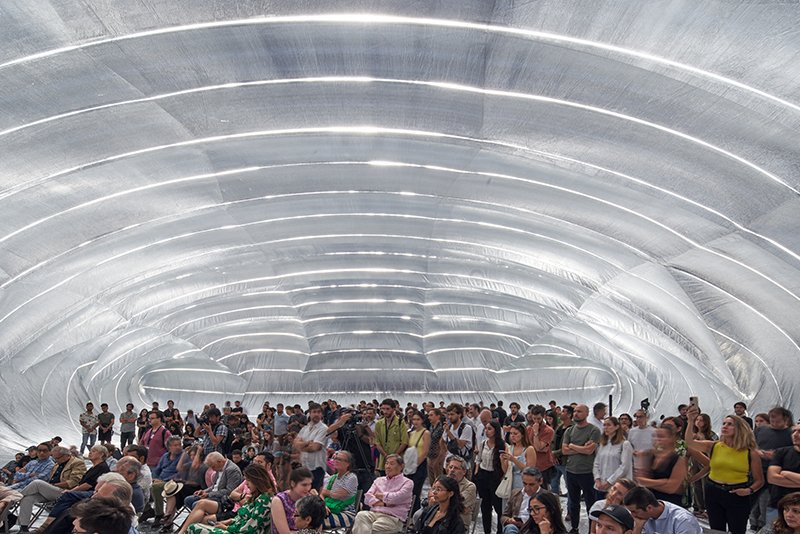 Interior of Guatero pavilion filled with visitors in Santiago