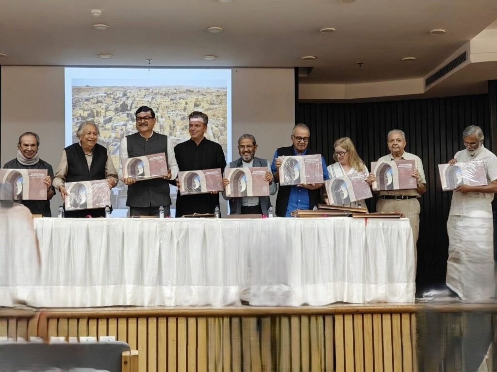 Raj Rewal and architects holding copies of Traditional Architecture and Its Relevance for Our Times at the book launch