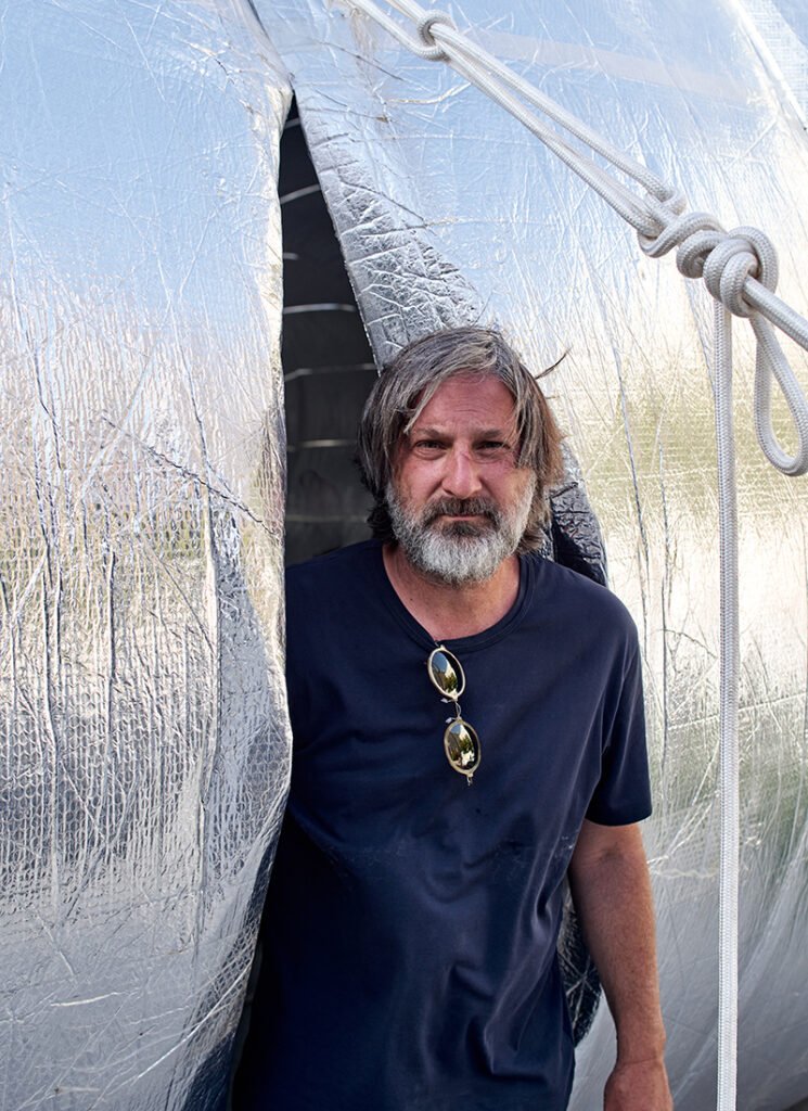 Architect Smiljan Radić inside the Guatero pavilion